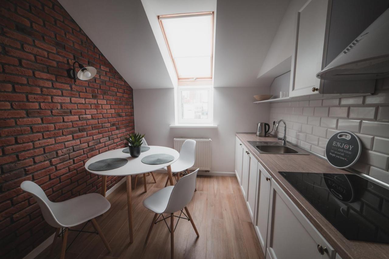 Kostjukowski Apartments Mudroho 12 V Lviv Bagian luar foto